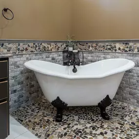 Clawfoot Tub with Pebble Tile