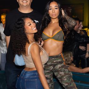 2 girls and a guy strike a pose as the enjoy the best Night life experience in San Diego at Oxford Social club