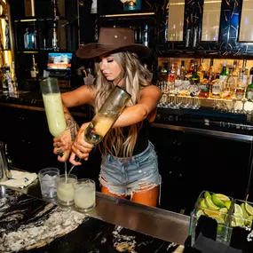 Bartender making delicious drinks