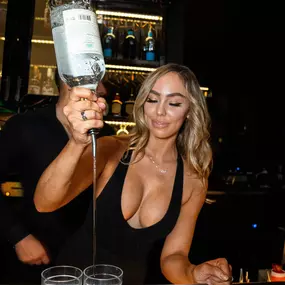 Bartender pouring shots at Oxford Social club