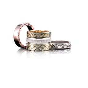 With multiple metal options and detailed designs, you can find the perfect band for his finger.