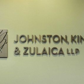 Johnston, Kinney & Zulaica LLP | interior signage