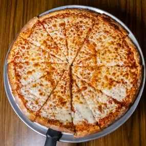 cheese pizza with slice server