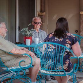 Residents at Saint Therese of Oxbow Lake can sit back and relax on a beautiful patio that allows for some well needed fresh air.