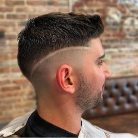 High Skin Fade Haircut with Line Design