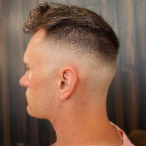 High skin fade with drop fade in back.