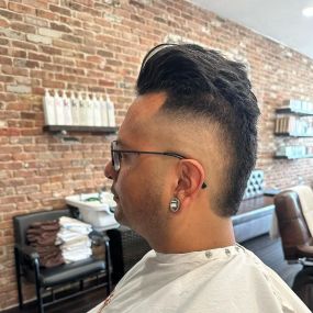 High Skin Fade Faux Hawk Haircut