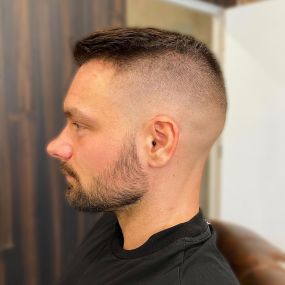 Mid skin fade with drop fade in back.