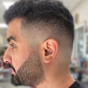 Low skin fade with drop fade in back.