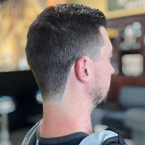 Half fade tapered haircut.