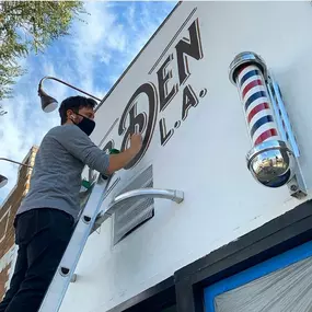 Barber shop painted sign