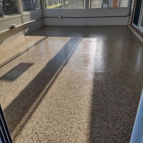 Custom Sedona Flake Epoxy 3-season patio floor in State College, PA to bring 2021 to a close!  Happy New Year!