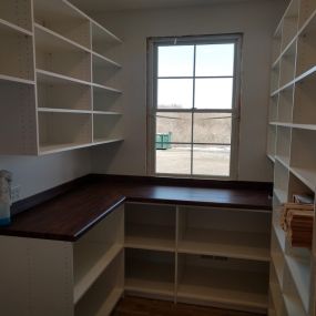 Custom kitchen pantry with custom countertop in Bellwood
