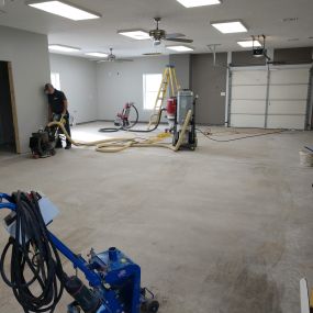 Custom Epoxy garage floor beginning floor preparation in Bellefonte, PA