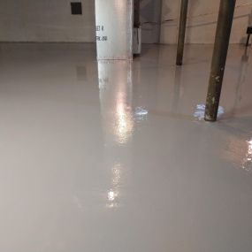 Custom Epoxy solid surface finish basement floor in State College, PA