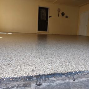Beautiful custom Premier One epoxy garage floor