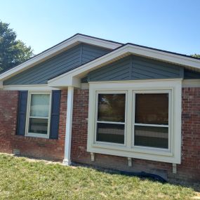 Window World Insulated Vinyl Siding, and New Replacement Windows.