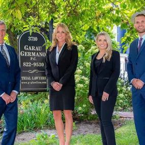 Garau Germano attorney group photo