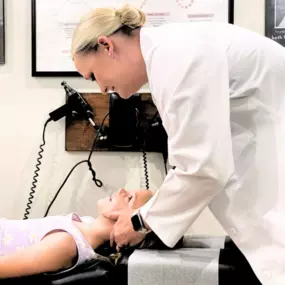 Dr. Candice Forde with chiropractic patient