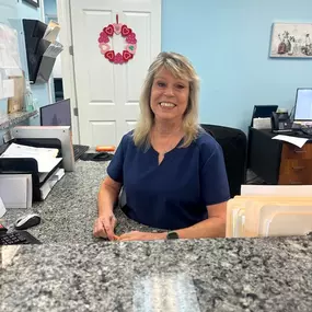 Staff at the front desk of SunCoast Spine Care in Bradenton Florida