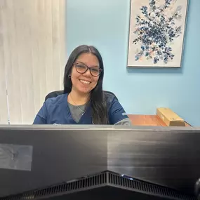 Staff at the front desk of SunCoast Spine Care in Bradenton Florida