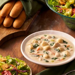 Chicken & Gnocchi: A creamy soup made with roasted chicken, Italian dumplings and spinach.