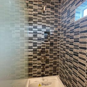 Large modifications required to transform this shower into a whirlpool tub