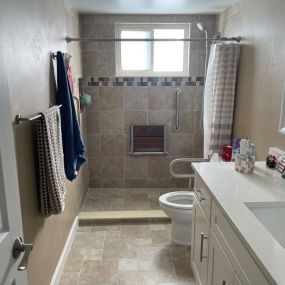 Shower with teak wood reclining seat
