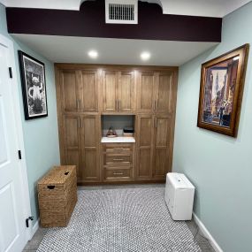 Showplace Cabinetry and beautiful decorative photos make this master bathroom beautiful!