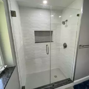 Glass shower enclosure