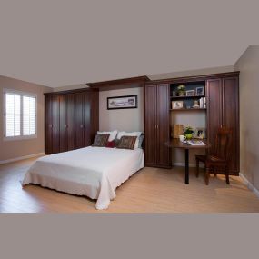 Murphy Beds can provide a bit of elegance when paired with deep cherry cabinets. Live your best life without all the clutter when everything has a place. Our professionals listen to your needs and help you design the perfect storage solutions.