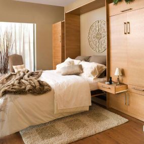 Need a spare bedroom but don’t want to take up precious space with a bed? This Murphy Bed is a perfect way to have it both ways. Pull-out nightstands add convenience for guests, and they can be put away when the visit is over. #TailoredLivingNorthTampa #FreeConsultation #MurphyBed #TailoredToYourNee