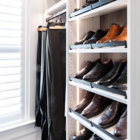 Talk about suited and booted. Our custom-designed Closets are created to suit your home and lifestyle. Hang your suits and display your shoes in style!