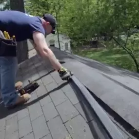 Installing a a Ridge Guard ridge vent to stop squirrels from getting in