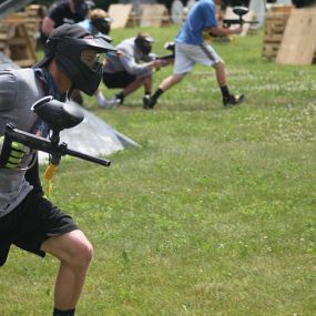 Player running for cover at White River Paintball