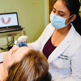 Nashua Dentist Praveena Phat is examining patient