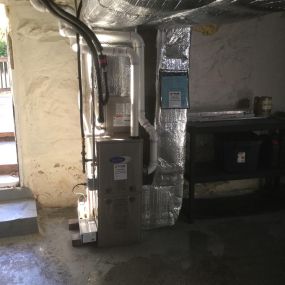 Installed Two Carrier Performance 1.5 - 2.0 Ton Central Air Conditioning Systems with Two Carrier Performance 96% AFUE 40000 BTUH Gas Furnaces, Ductwork, and Removed all baseboards from the home in Cos Cob, CT.