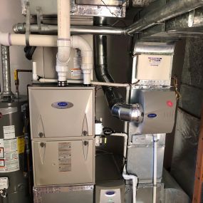 Carrier Infinity 97.4% AFUE Variable Speed Modulating Gas Furnace, Carrier Air Purifier, Carrier Smart Sensor and Carrier Humidifier installed in Madison, CT.