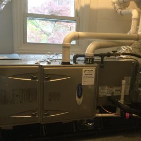 Installed Two Carrier Performance 1.5 - 2.0 Ton Central Air Conditioning Systems with Two Carrier Performance 96% AFUE 40000 BTUH Gas Furnaces, Ductwork, and Removed all baseboards from the home in Cos Cob, CT.