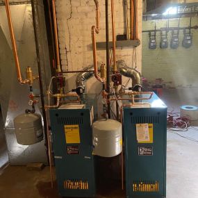 Two Burnham Gas 105 BTU Boilers X204 Installed in New Haven, CT.