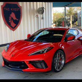 The Krest Hand Car Wash & Detail Super Center in Magnolia, TX performing luxury hand car washing services and auto detailing.