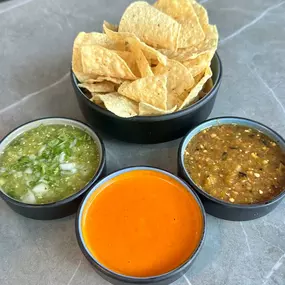 A little bit of Classic Green on my chip,
A little bit of Morita takes the dip,
A little bit of Atómica brings the heat…
Rio’s salsa trio can’t be beat. 
House-made. Fresh every morning. Served with a pile of warm chips and absolutely no shame in double-dipping.