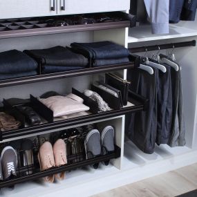 Ready for a little home organization in 2024? Closet space is valuable and our designers can help utilize every inch of space with a custom closet designed specifically for you.