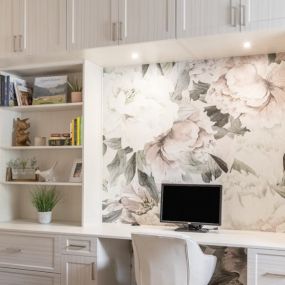 We are here for your WFM office inspiration! We love the modern white and silver cabinet combination paired with the beautiful floral accents. Want your dream office? Call us today!