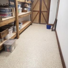 Even storage spaces need nice floors! This Epoxy Floor by Tailored Living of Niantic & Mystic will stand up to traffic, dust and dirt, and the occasional dropped box! #TailoredLivingNianticMystic #EpoxyFlooring #FreeConsultation #TailoredToYourNeeds