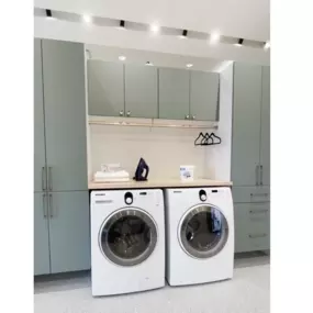 Our custom laundry room solutions integrate seamlessly with your existing appliances, adding crucial holding and storage space.