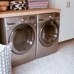 Laundry day does not have to be the worst day of the week! Our fall-inspired laundry rooms make chores a breeze. With efficient storage solutions, ample counter space, and stylish design elements, you'll actually enjoy doing laundry.