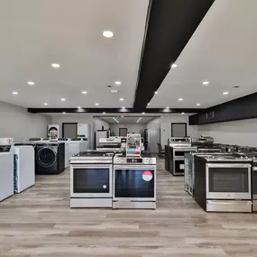 Wide-angle view of Lehigh Supply's newly renovated appliance showroom featuring a clean, open layout.