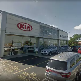 Front of the Russ Darrow Kia of Waukesha building.