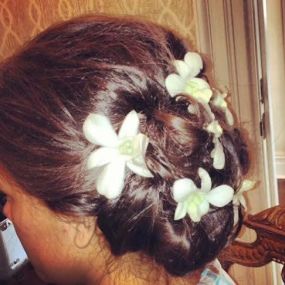 Bridesmaid updo with flowers